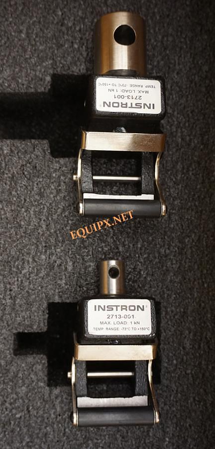 Used Instron 2713-001 self tightening roller grips with 1kN (225lbf) capacity