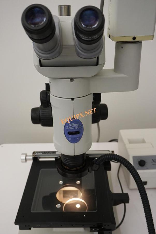 Used Nikon SMZ1500 stereozoom with 15:1 zoom ratio, camera tube, tilt viewing head
