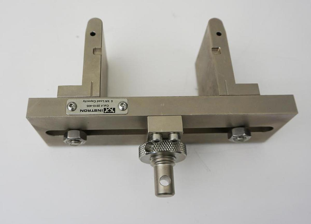 Used Instron cat.# 2810-405 5KN (1124lbf) 4-Point Bend upper anvil assembly