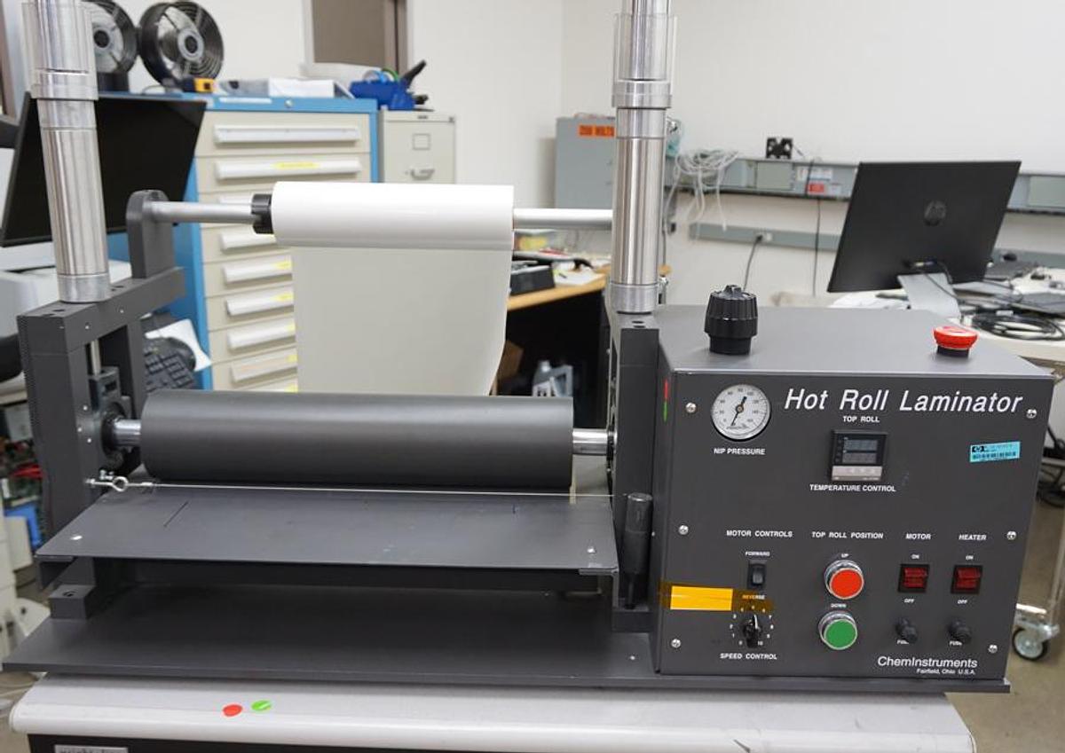 Preowned ChemInstruments HL-100 Hot Roll Laminator with base cabinet