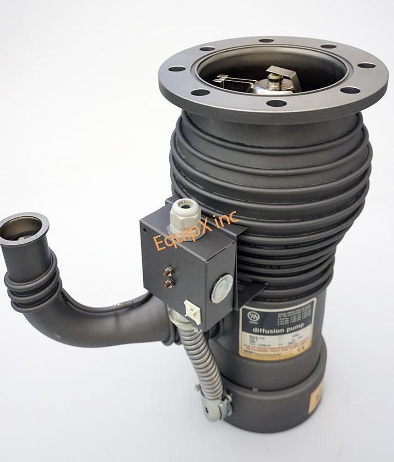 Used Varian VHS-4 diffusion pump, no.86460316, NEW , with extended cold cap, 208 V, single phase, ASA flange