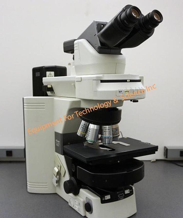 Used Nikon Eclipse 90i microscope configured for brightfield, DIC, fluorescence