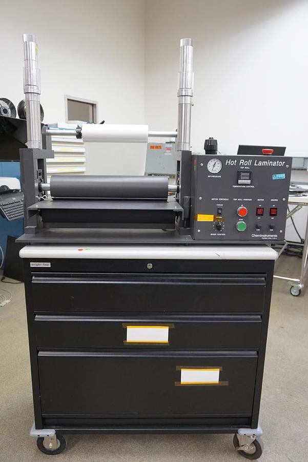 Preowned ChemInstruments HL-100 Hot Roll Laminator with base cabinet