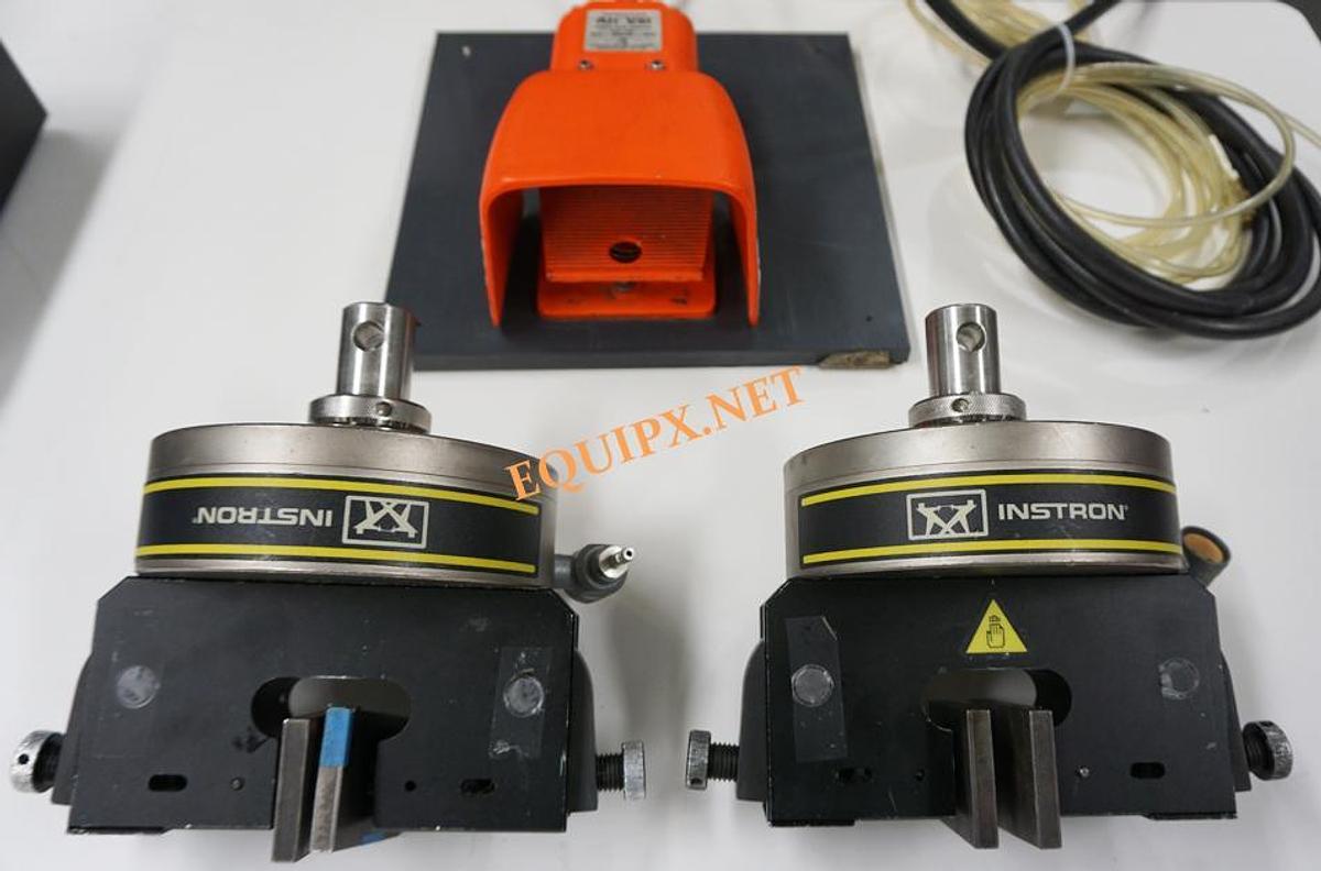 Used Instron 2712-017 5kN (1124lbf)  pair pneumatic side action grips with jaw faces