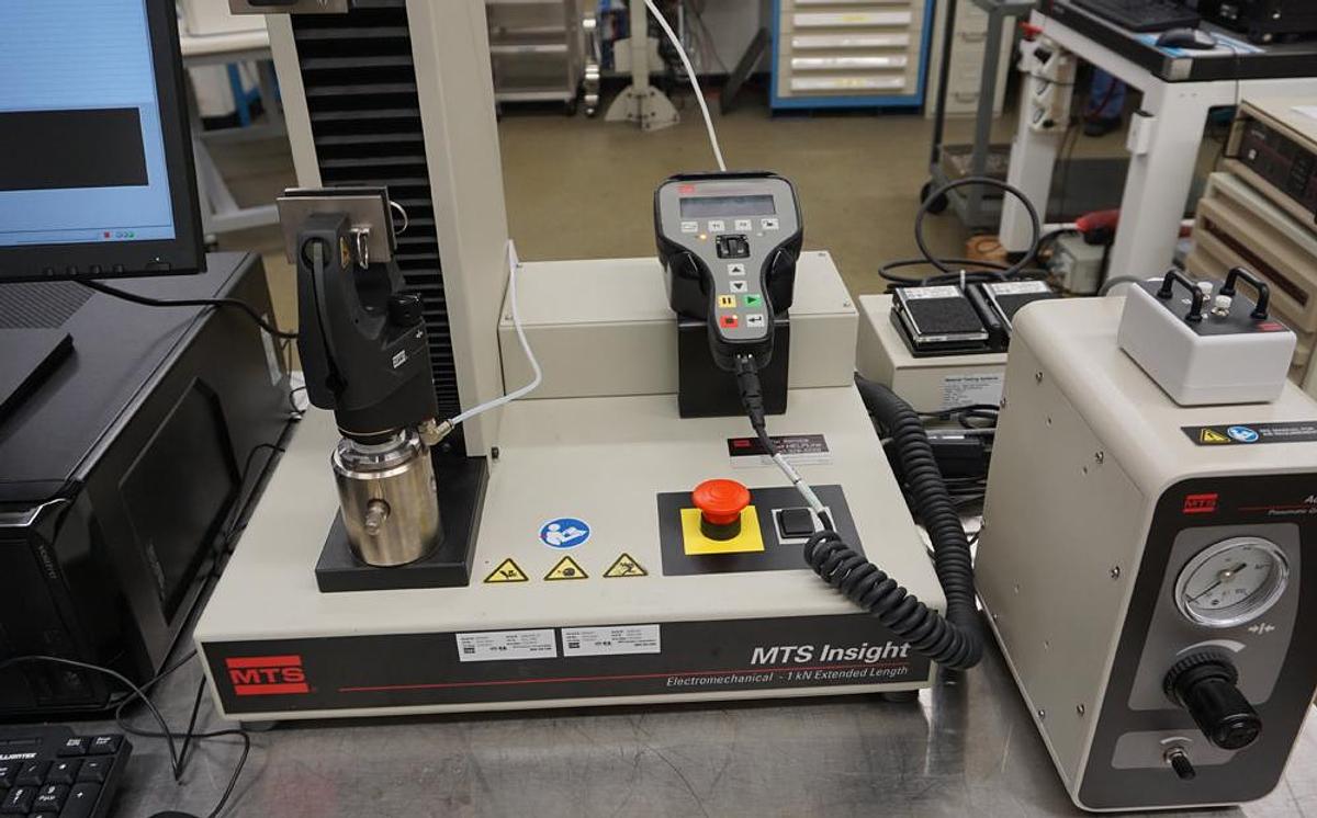 Used MTS Insight 1kN (225lbf) 1EL tensile and compression testing machine with Extended frame, 3 load cells, Pneumatic grips,  and Testworks 4 software