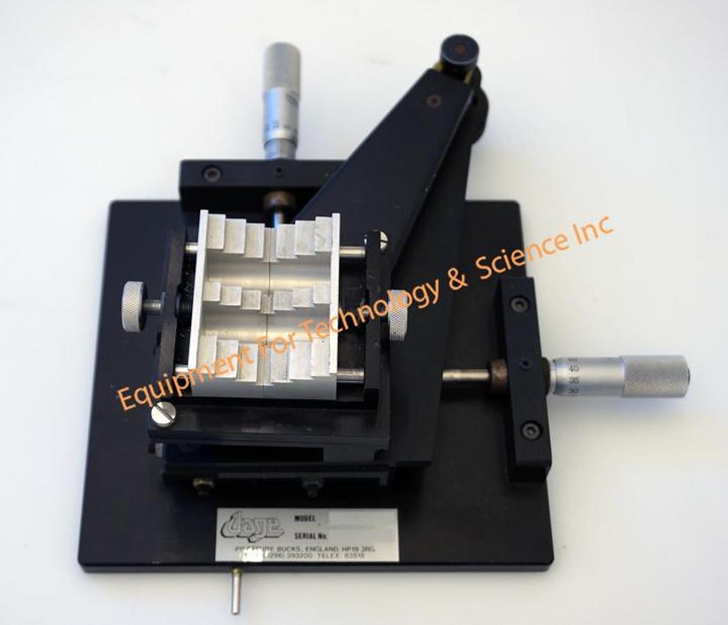 Used Dage hold down fixtures