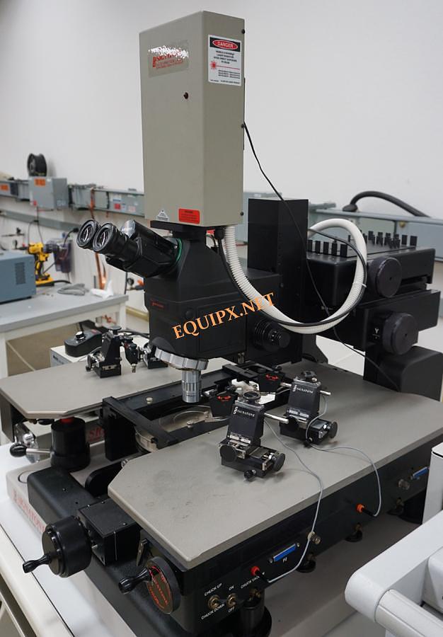Used Signatone CM200 Checkmate semiautomatic 200mm prober with L-LCS2 532nm/ 355nm laser, Mitutoyo microscope and (4) S925 positioners