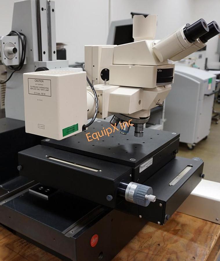 Used Leitz heavy base and support with 6x6 precision manual stage and Zeiss microscope