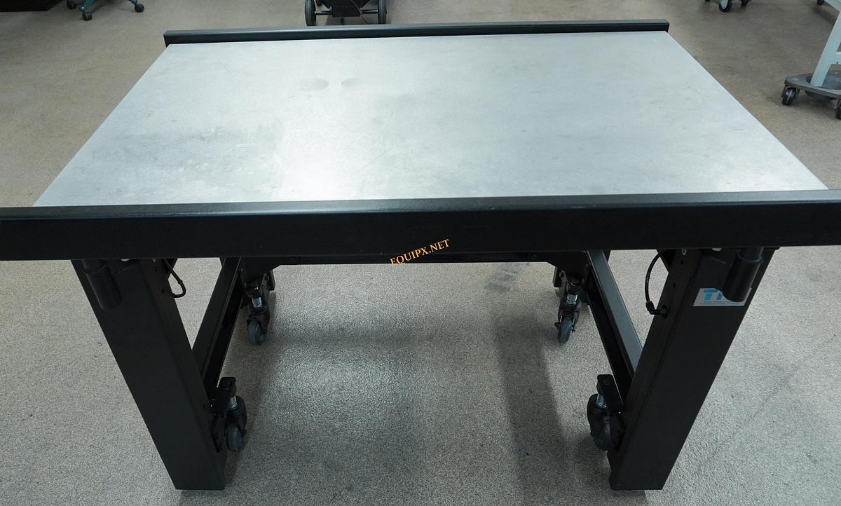 Used TMC 63-541 30x47 vibration isolation table with optional casters