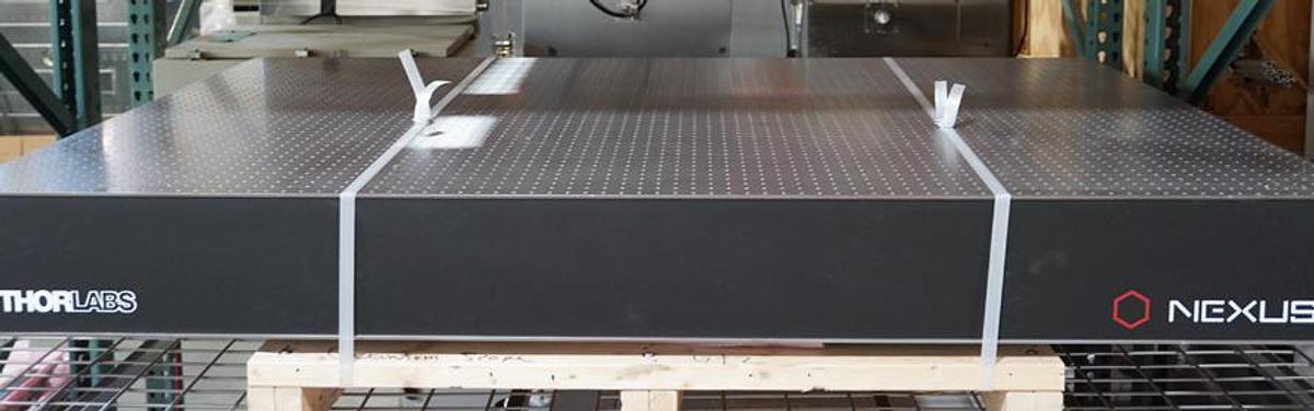 Preowned 2022 Thorlabs T1220C 1.2m x 2m x 210mm Metric Optical Breadboard with M6 threaded holes and set of (4) pneumatic supports