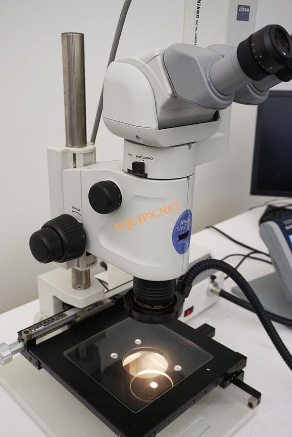Used Nikon SMZ1500 stereozoom with 15:1 zoom ratio, camera tube, tilt viewing head