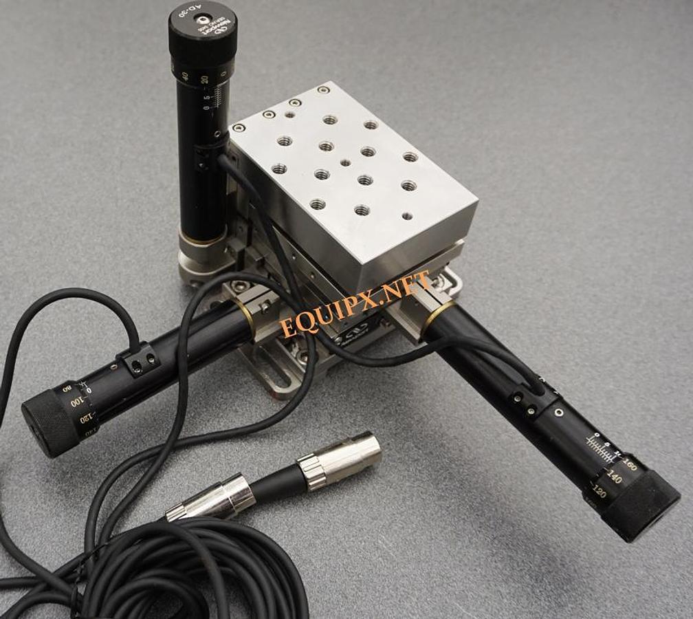 Used Newport 562-XYZ stage with (3) AD30 piezo actuators and ESA-C 3 axis controller with IEEE