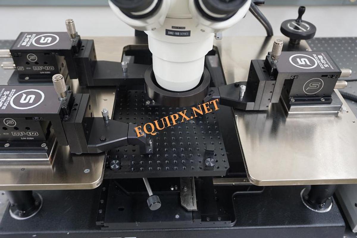 Used Signatone 1160A-6N manual prober with (3) S-M40 Rf positioners and Olympus microscope with camera