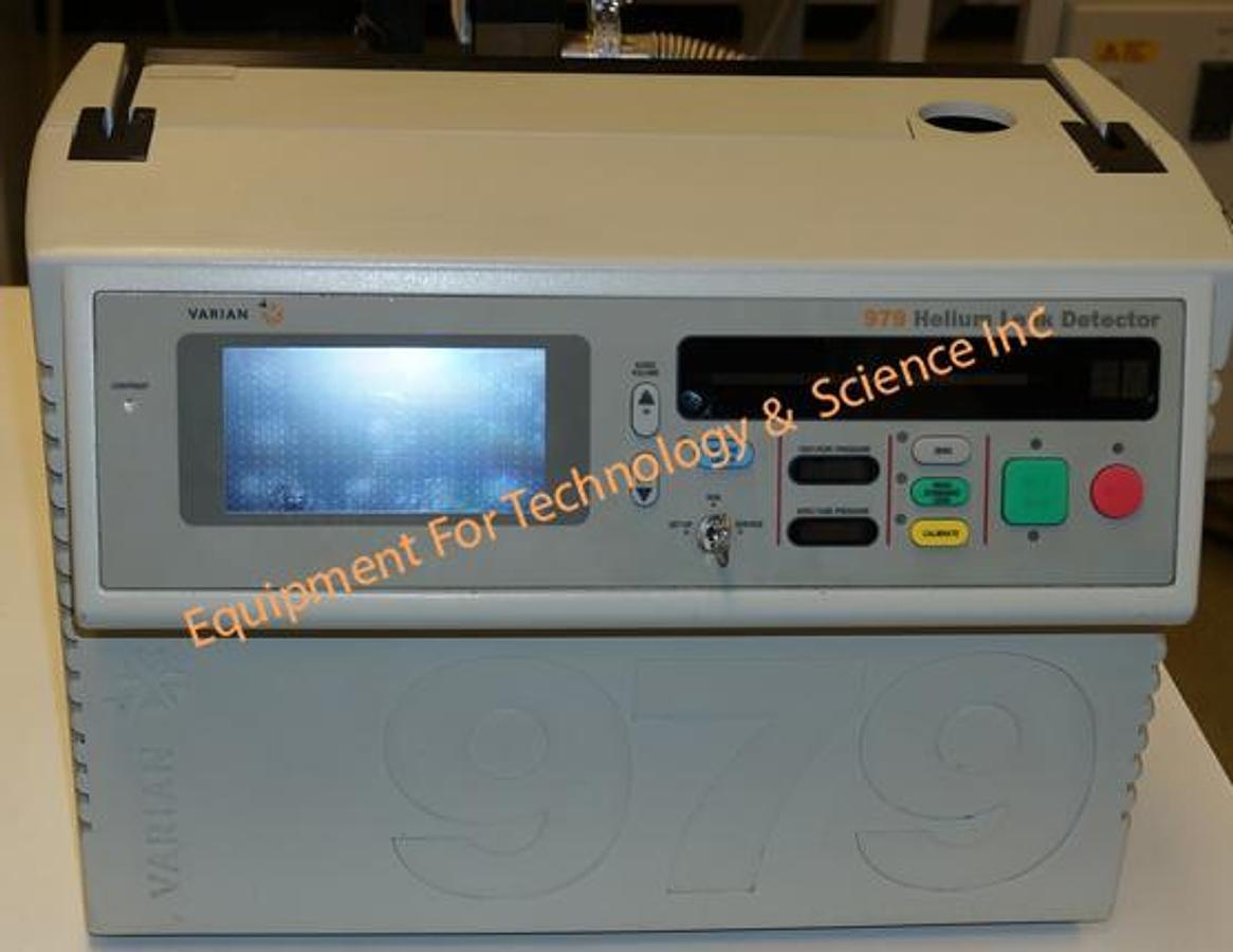Used Varian 979 leak detector with internal turbo and Alcatel backing pump
