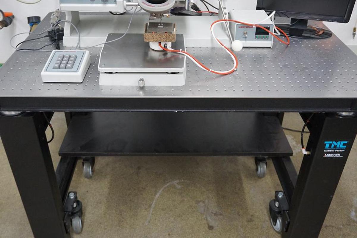 Used Ametek TMC Vibration Isolation Table with 2" breadboard and casters