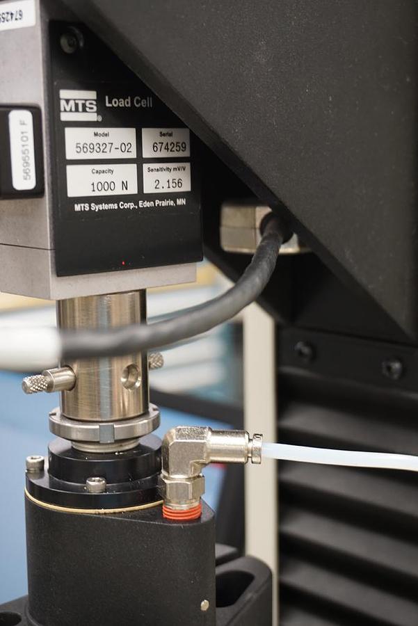 Used MTS Insight 1kN (225lbf) 1EL tensile and compression testing machine with Extended frame, 3 load cells, Pneumatic grips,  and Testworks 4 software