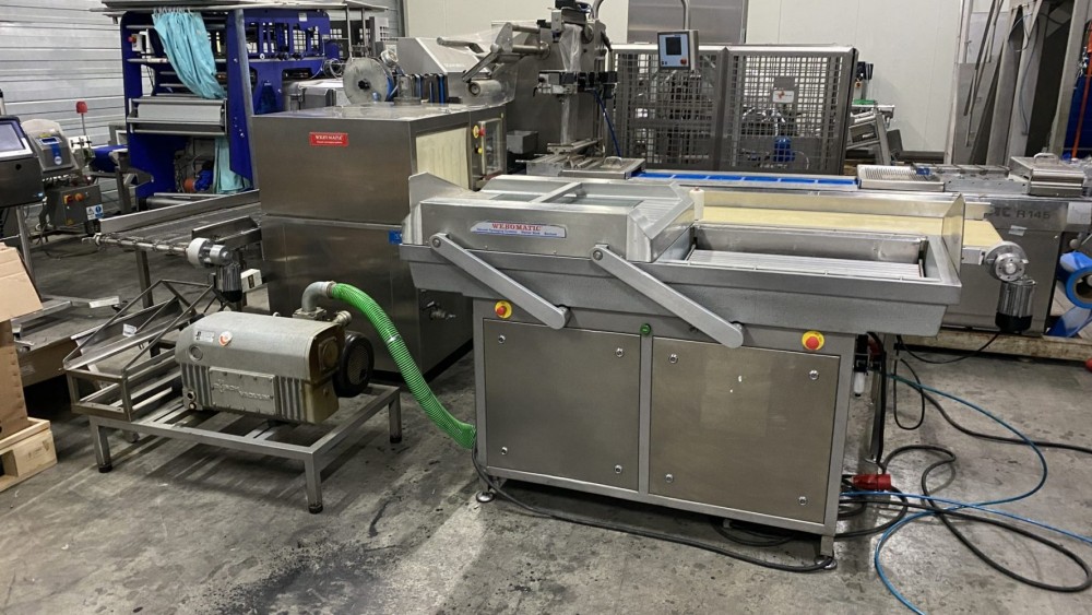 Used Webomatic vacuum line