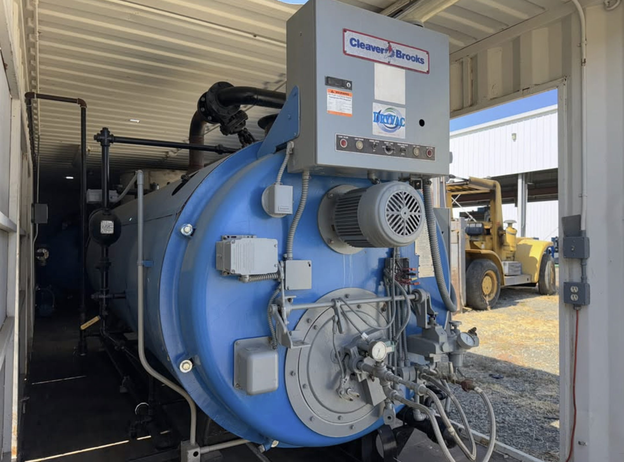 Used Cleaver Brooks CB-900-100 Packaged Steam Boiler 100 HP Low Pressure Dual Fuel Gas Oil 15 PSI Container Mounted Skid Built 1979