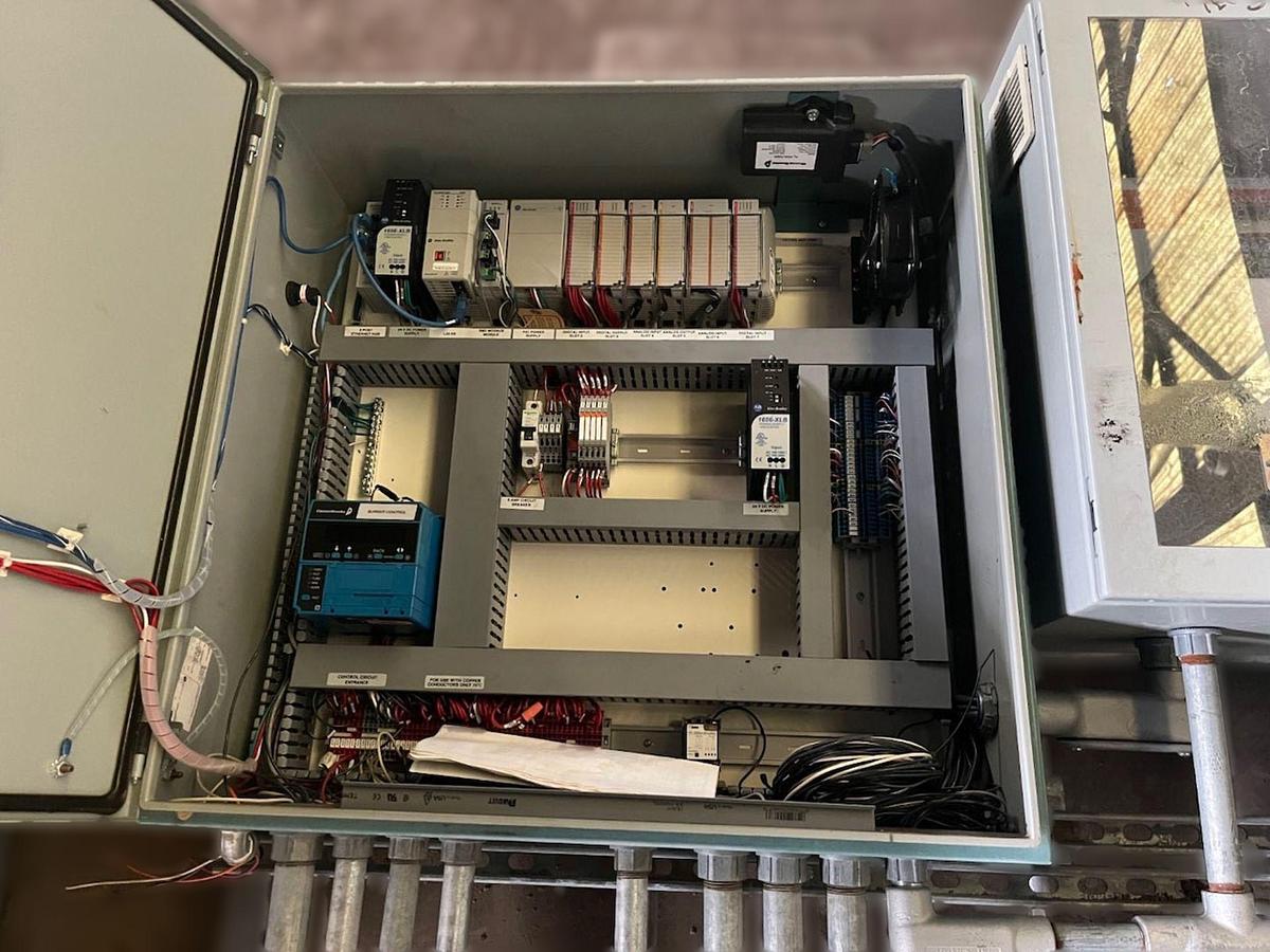 Used Burnham 700 HP 150 PSI Industrial Steam Boiler - 3P-700-50-LB with Cleaver Brooks Controls