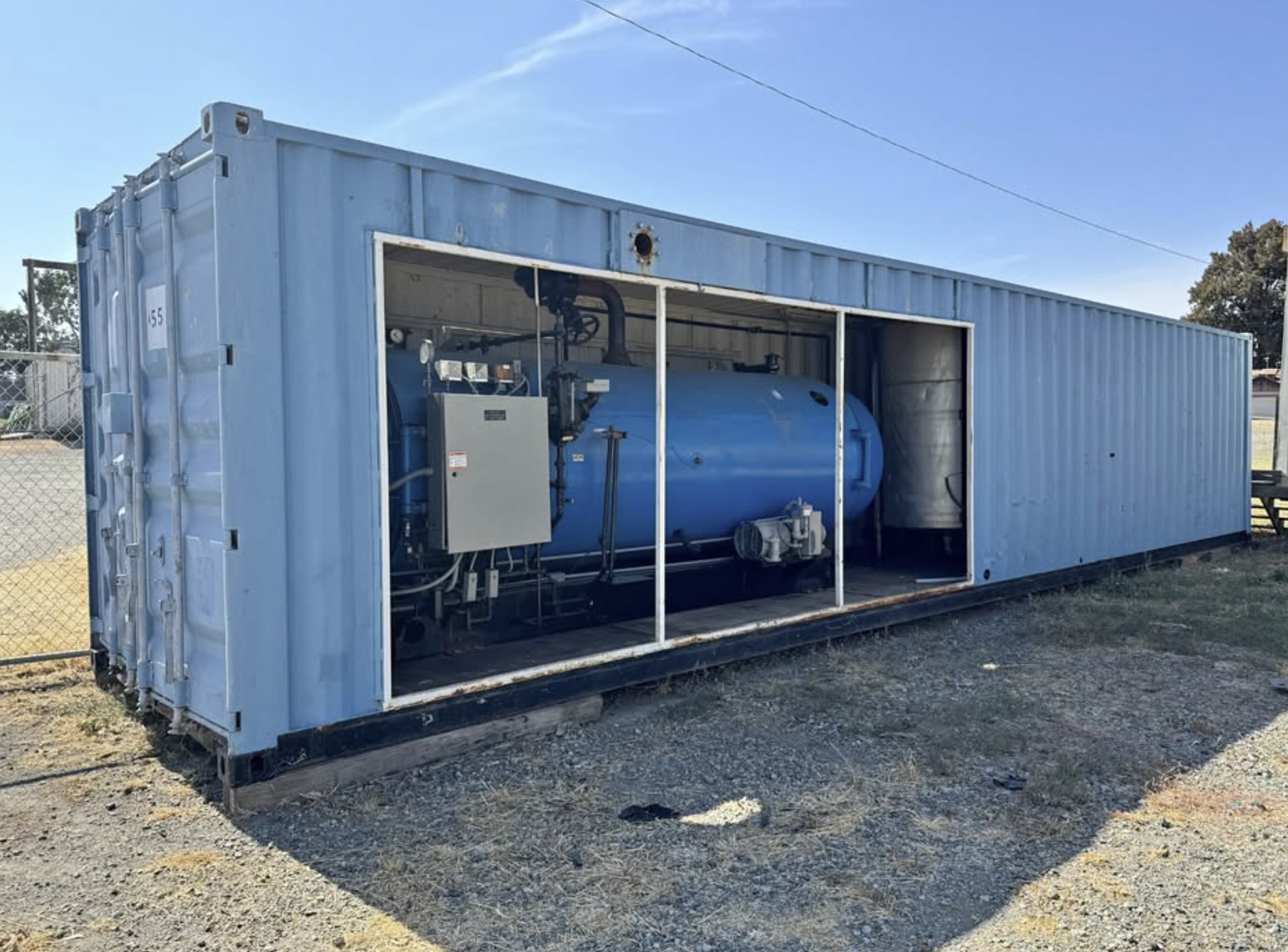 Used Cleaver Brooks CB-900-100 Packaged Steam Boiler 100 HP Low Pressure Dual Fuel Gas Oil 15 PSI Container Mounted Skid Built 1979