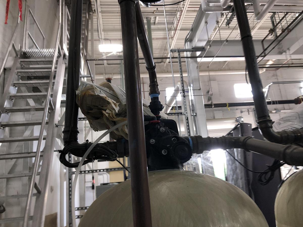 Used Clack Water Treatment System with Polyethylene Tanks