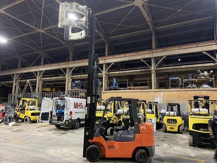 Used 8,000 POUND TOYOTA FORKLIFT MODEL 7FGCU35 WITH 63" CASCADE PAPER CLAMP