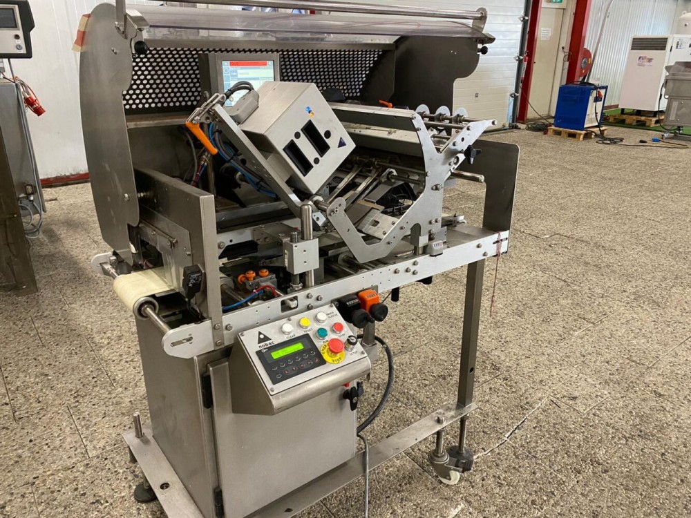 Used Ravenwood banding machine with printer