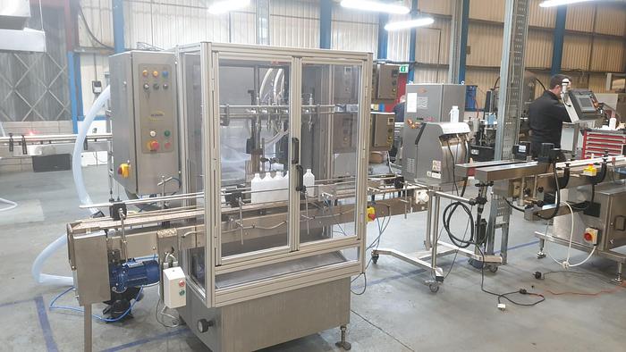 Used King 6 head liquid filler