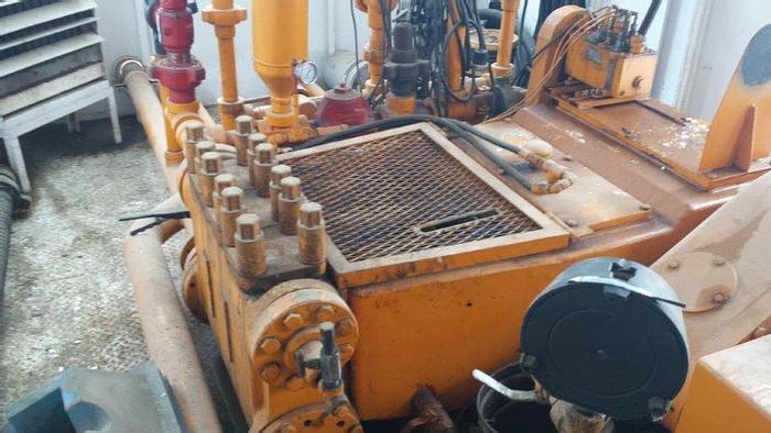Used National JWS-165-L, 4x5 Triplex Mud Pump Package