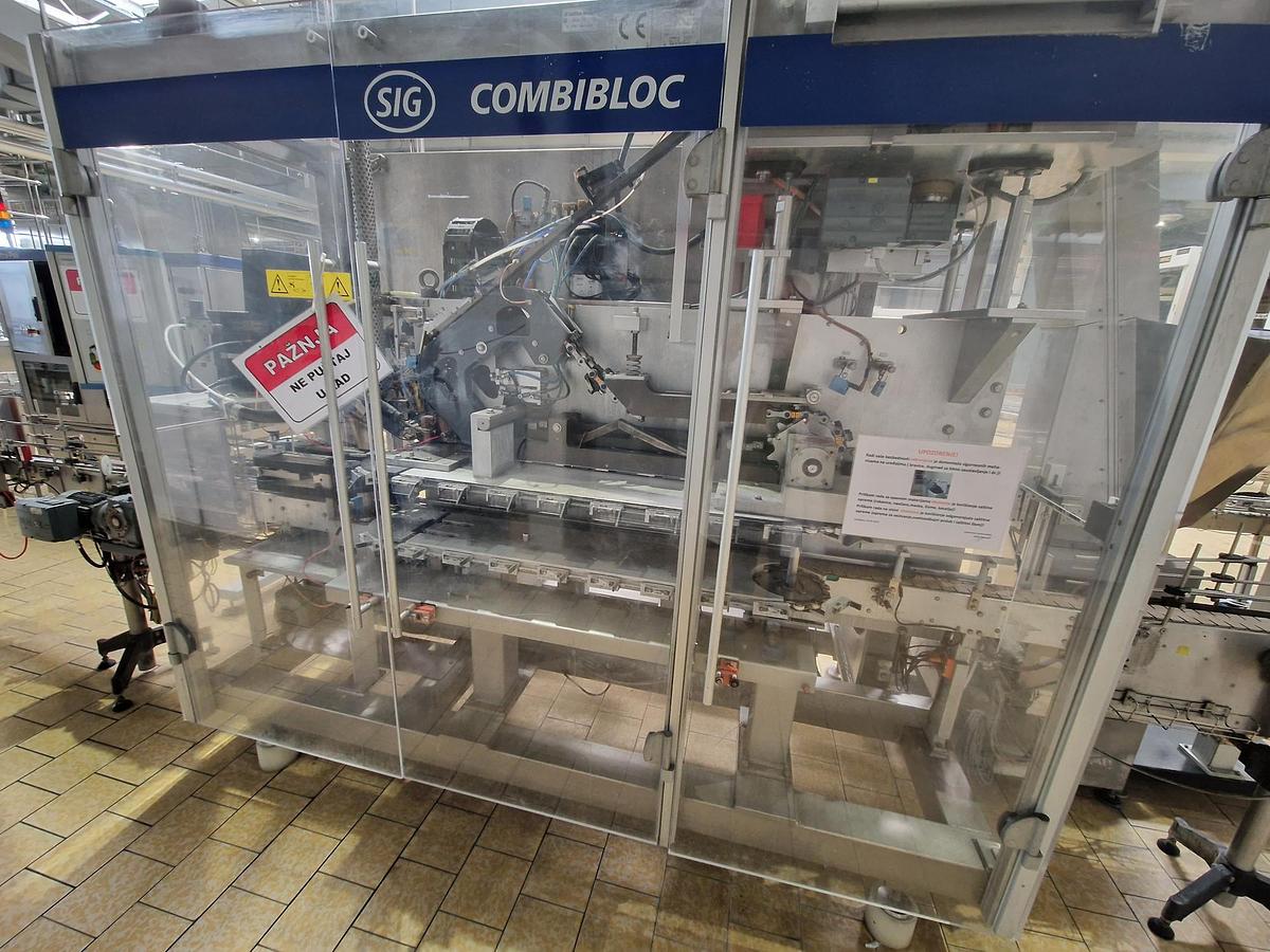 Used USED SIG CFA 406 FILLING LINE FOR SALE
