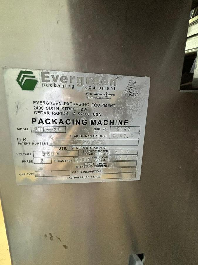 Used USED EVERGREEN GABLE TOP FILLING AND CAPPING MACHINE YEAR 2007
