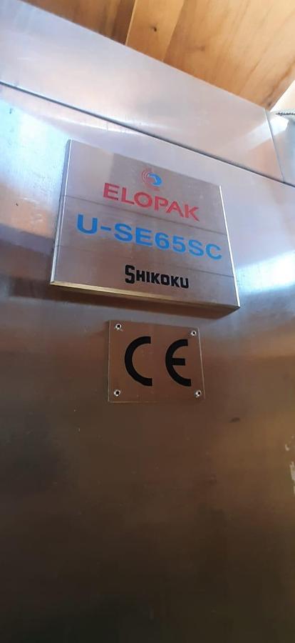 Used GABLE TOP COLD FILLING AND CAPPING MACHINE FOR SALE