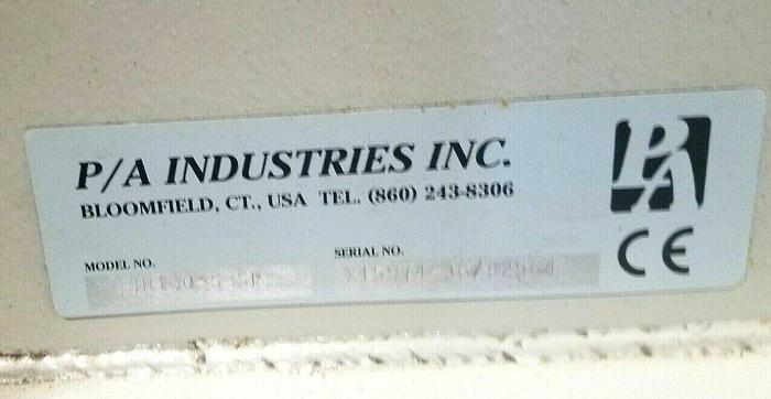 Used PA Industries Double Coil Motorized Stock Reel with Paper Interleaf Payoff Feed