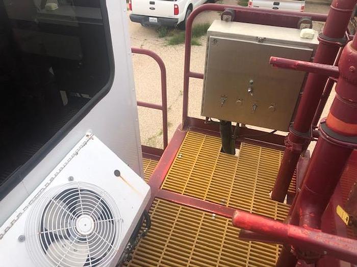 Used 2010 Stewart and Stevenson Single Pump trailer with mixing system.