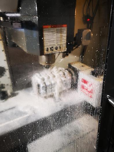 Used VERTICAL MACHINING CENTER HAAS VF2 TR - WITH COOLING TROUGH SPINDLE