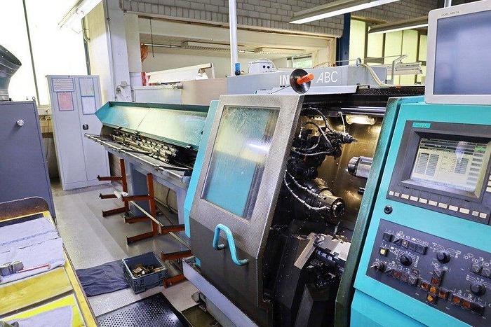 Used CNC LATHE INDEX ABC 42 WITH BAR FEEDER AND TOOLS