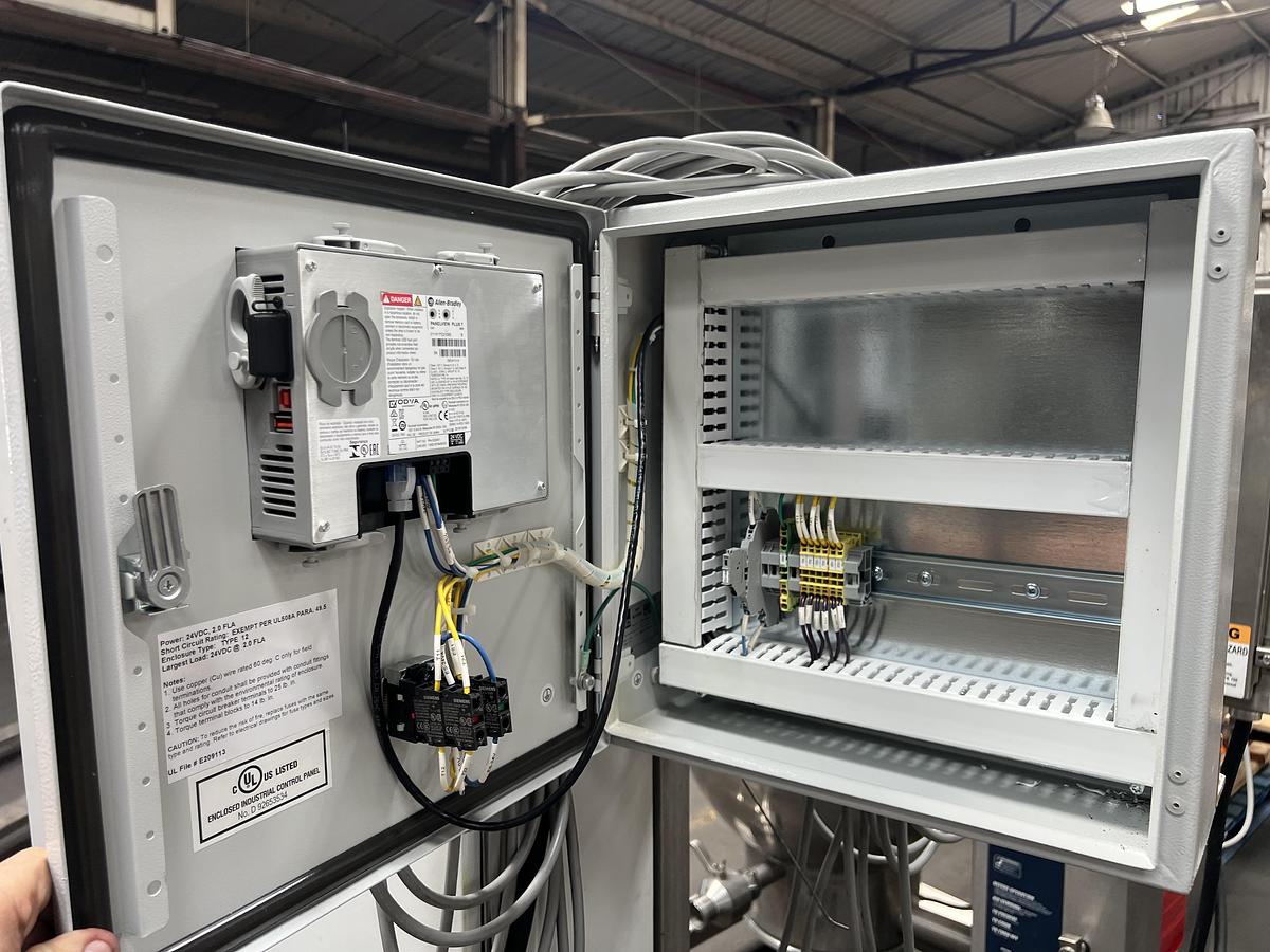 Used Never used control panel with an Allen-Bradley MicroLogic 1400 PLC