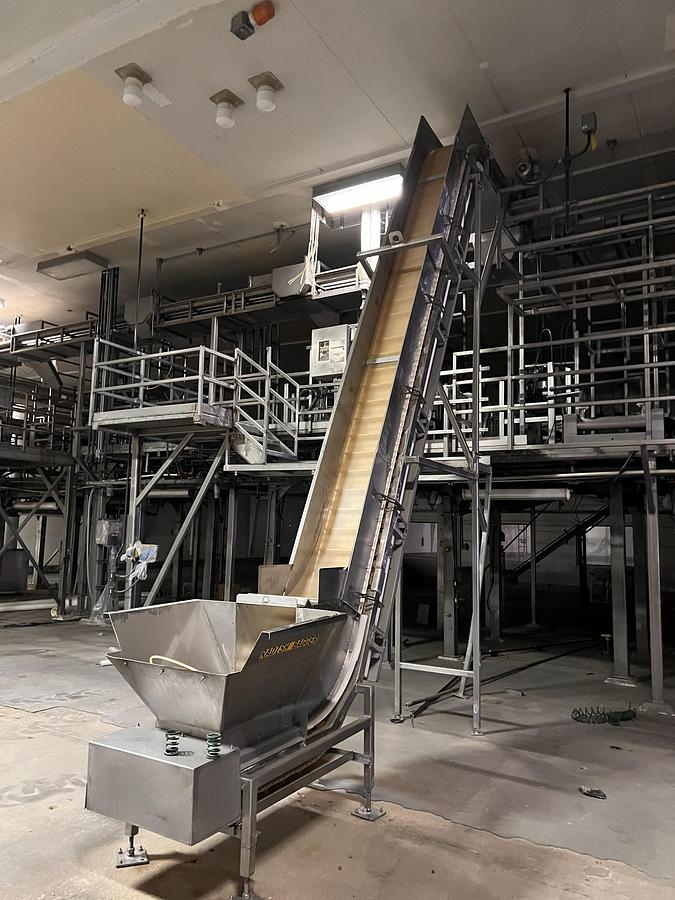 Used 8” wide x 20’ tall stainless steel gooseneck style flighted belt elevator