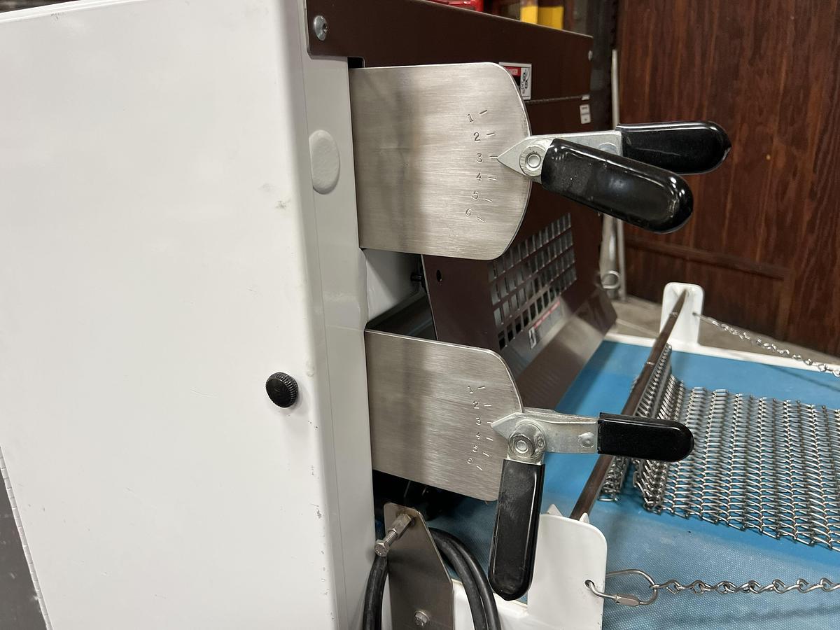 Used Bloemhof model Express 1260 molder and dough sheeter for breads