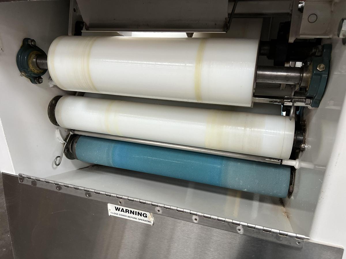 Used Bloemhof model Express 1260 molder and dough sheeter for breads