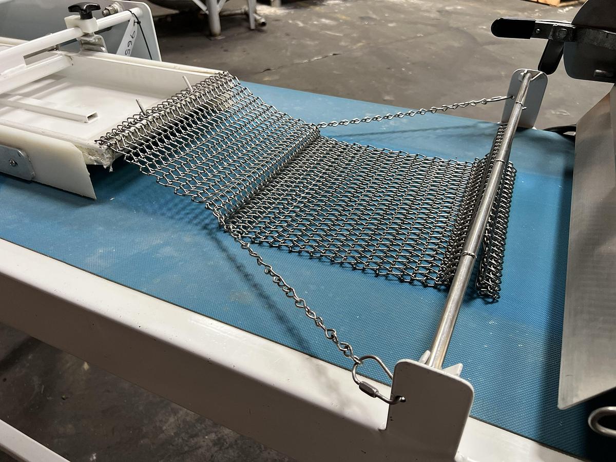 Used Bloemhof model Express 1260 molder and dough sheeter for breads