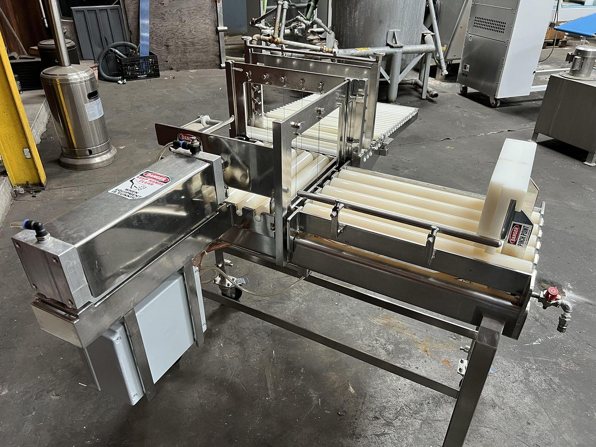 Used Econo Cheese stainless teel two-way pnuematic cheese block cutter