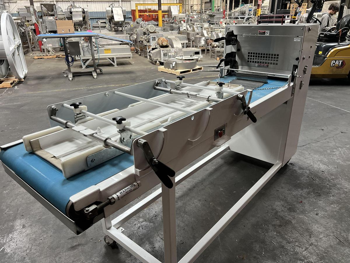 Used Bloemhof model Express 1260 molder and dough sheeter for breads
