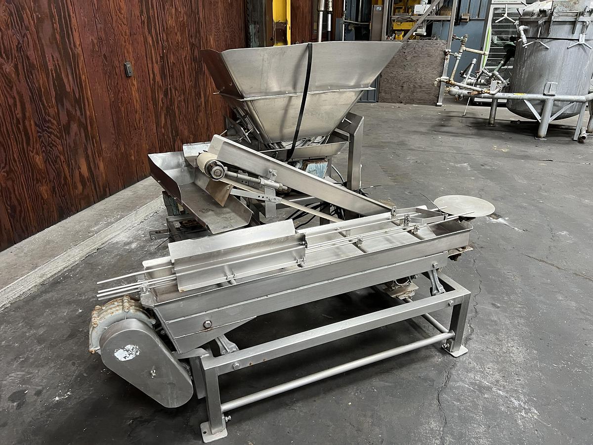 Used Custom manufactured slot filler for 307x111 cans last filling bay shrimp