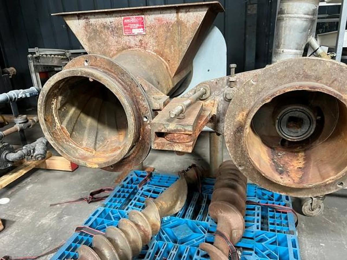 Used Autio model 1101 GH grinder with an Autio positive displacement vane pump