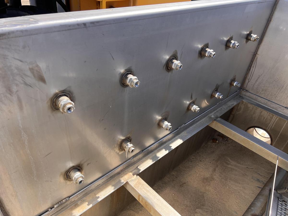 Used 48” wide flooded wash tank elevator for floating product