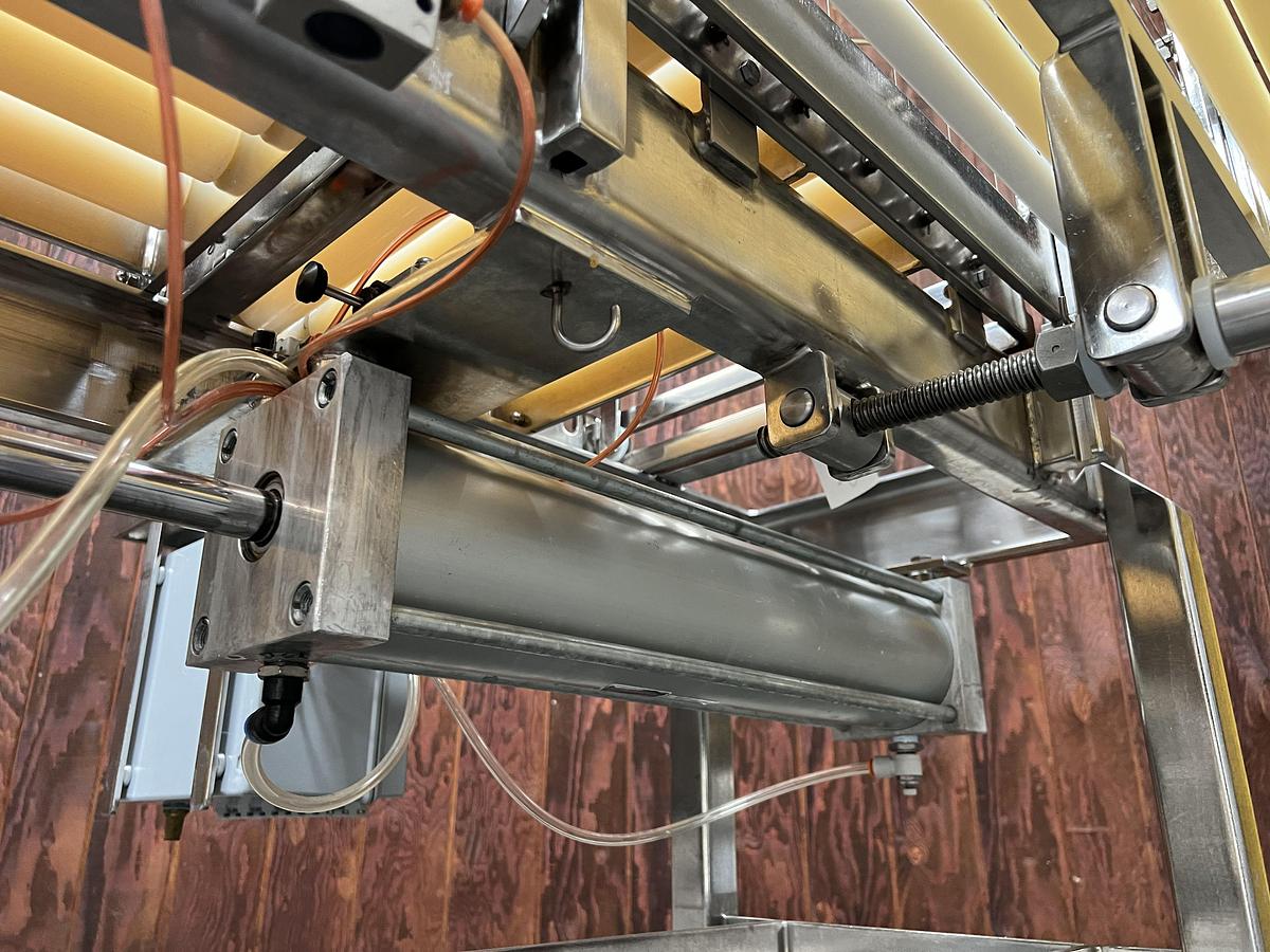 Used Econo Cheese stainless teel two-way pnuematic cheese block cutter