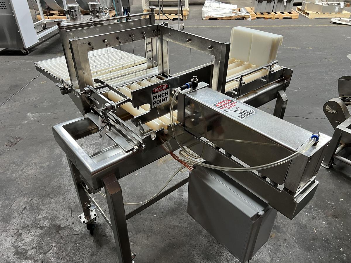 Used Econo Cheese stainless teel two-way pnuematic cheese block cutter