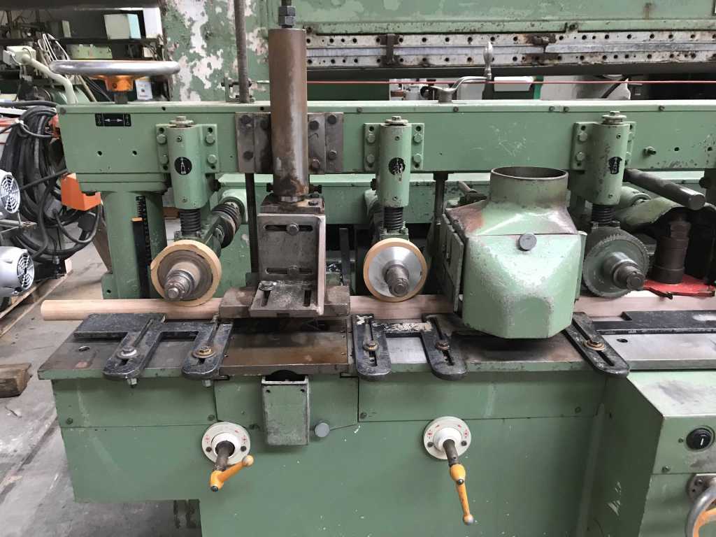 Usato Scorniciatrice marca Gubish attrezzata per pezzi tondi diam. 41mm (completa di utensili per altri diametri di pezzi tondi)