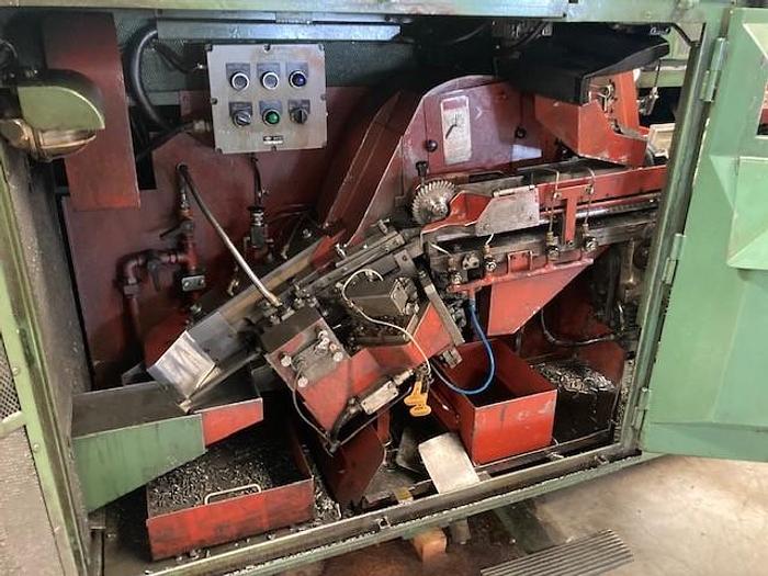 Utilisé Presses à double frappe avec roulage 